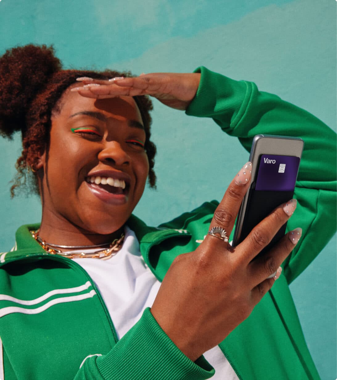 Girl excited to use Varo Believe card